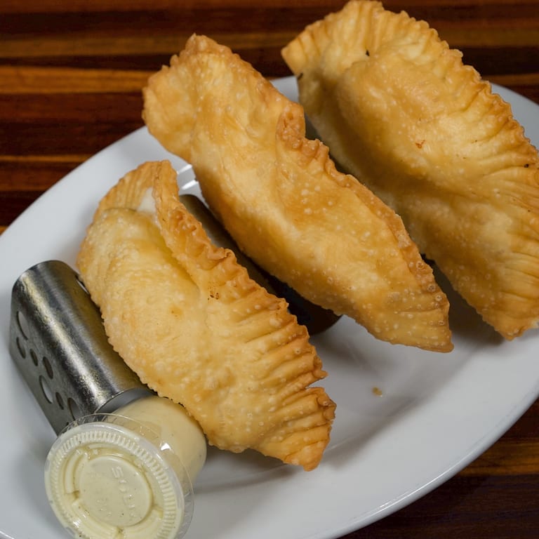 Savor our pastelitos today